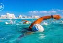 Miles de nadadores nacionales e internacionales participan en una de las competencias acuáticas más importantes de México, celebrada en las aguas turquesa del Caribe.